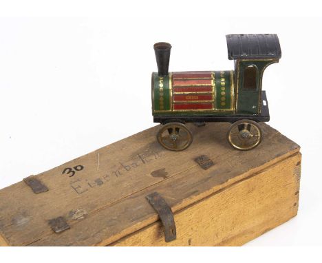 A small late 19th century Issmayer lithographed tinplate floor locomotive,  printed in dark green, red and gold, No.9350 with