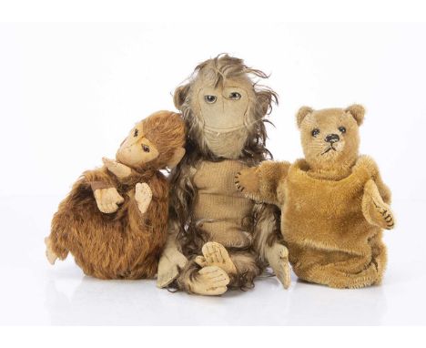 Teddy bear hand puppet and two monkeys, a British teddy bear hand puppet with short golden mohair, black boot button eyes, bl