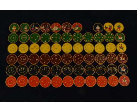 An Indian Ganjifa playing cards probably early 20th century, one hundred and twenty circular painted sliver of wood cards, in