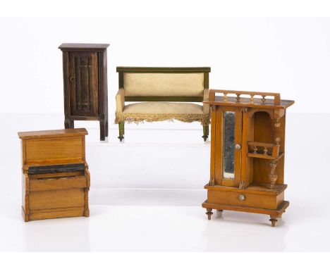 Early 20th century German dolls’ house furniture,  Schneegas upright piano —4in. (10cm.) high and mirrored wardrobe with one 