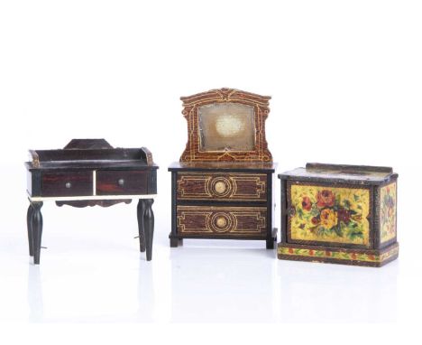 Three late 19th century German dolls’ house furniture, a dressing table covered with wood grained paper with gold detail and 