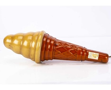 A 1960s plastic electric light-up shop ice cream cone, two-tone, sticker reads ‘Whites Value 4d’ —19 3/4in. (50cm.) high