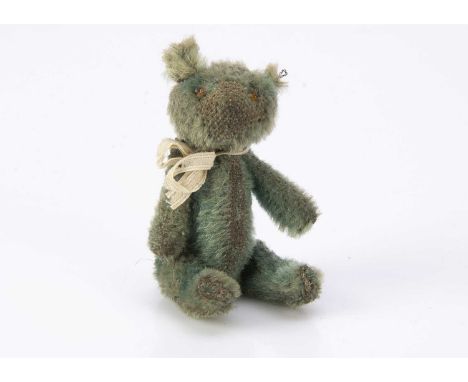 A rare Farnell blue mohair WWI soldier teddy bear, with orange glass bead eyes, pipe-cleaner ears, swivel head and pin-jointe