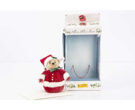 A Steiff limited edition Santa Rolly Polly teddy bear, 4354 of 5000, in original window box with certificate (box a little cr