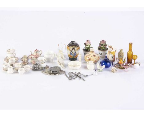 Dolls’ house porcelain and tablewares, two Dresden type flowers in pots —1 3/4in. (4.5cm.) high; a Goss jug and basin, blue g