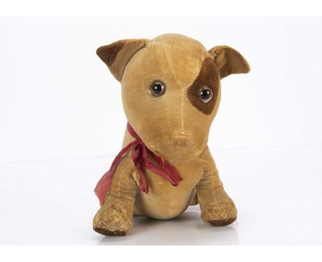 A British 1920s seated velvet puppy,  of cream velvet with brown velvet eye patch, tip of one ear, tail and soles of feet, cl