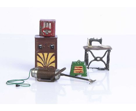 Dolls’ house metal technology,  a Taylor & Barrett cylinder vacuum cleaner with hose and plug, a red painted tinplate radio p