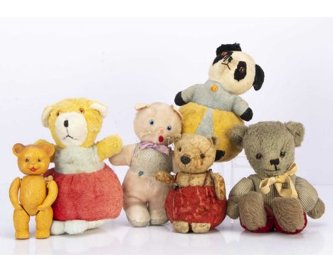 Three post-war roly poly teddy bears,  comprising of a blonde mohair Chiltern, with orange glass eyes, black plastic dogs nos