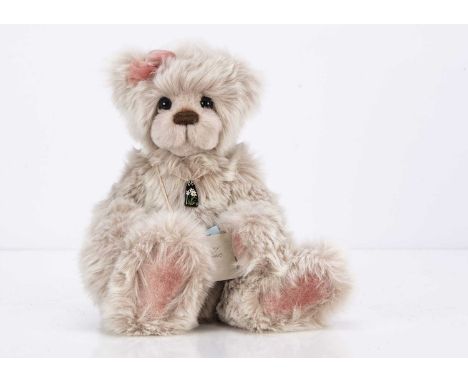 A Joxy Bears Daisy-May artist teddy bear,  1 of 1, by Jo Symon, with pink synthetic plush,  brown and black glass eyes on a w