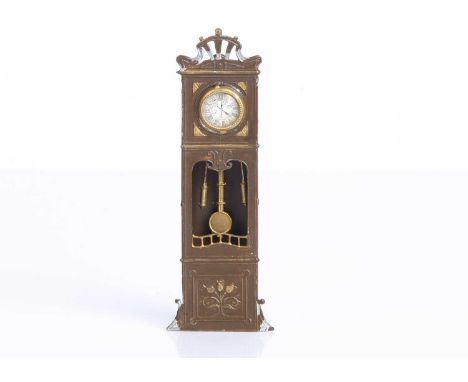 A German soft metal and tinplate dolls’ house Art Nouveau long case clock, painted brown and gold with rare Charles Morrell 3