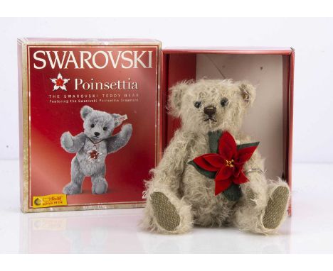 SALEROOM ANNOUNCEMENT - this bear does not belong with this box.A Steiff limited edition Poinsettia teddy bear, 917 of 1500, 