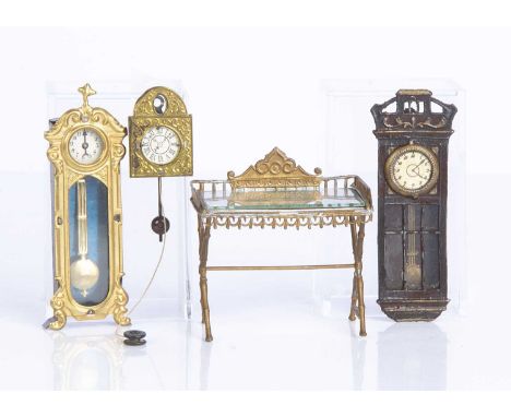 German dolls' house clock,  a gilt metal walk clock with pendulum —3 3/4in. (9.5cm.) high, a gilt metal cookoo clock with pen