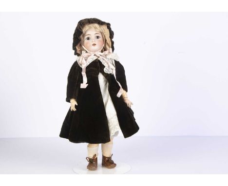 A Simon & Halbig for Kammer & Reinhardt child doll,  with brown sleeping eyes, pierced ears, blonde mohair wig, jointed compo