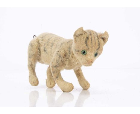 A Steiff head turning Kitty cat 1931-1934,  with white mohair and grey airbrushed strips, green and black glass eyes, pink st