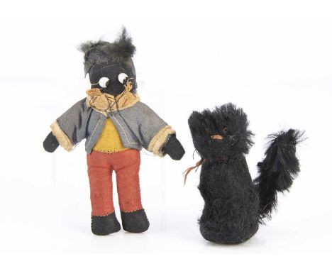A British lucky black Cat mascot, similar to a solider cat, with black mohair, orange and black glass eyes, pink horizontal s