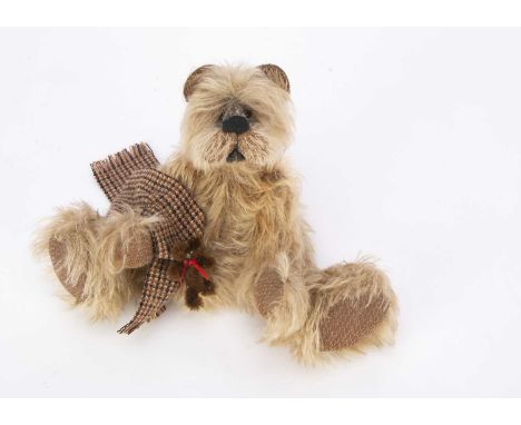 A Would-U-Like Bears Angus teddy bear, by Richard and Lisa Gunston, with yes/no head mechanism and card tag --10in. (25.cm.) 