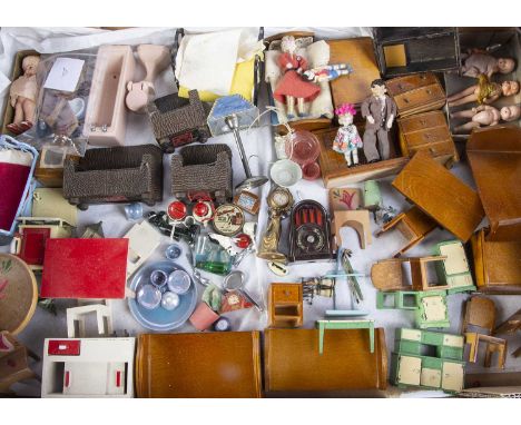 A quantity of 1930-50s dolls’ house furniture and chattels, including Pit-A-Pat sofa and two chairs with red labels —3 1/2in.