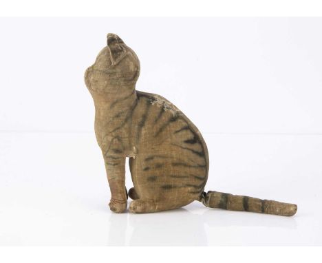 A rare early Steiff seated velvet cat,  white velvet with airbrushed black tabby markings, clear glass eyes with yellow iris,
