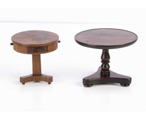 Two miniature circular tripod tables, a rosewood table with turned column —4in. (10.5cm.) high; and another with two drawers 