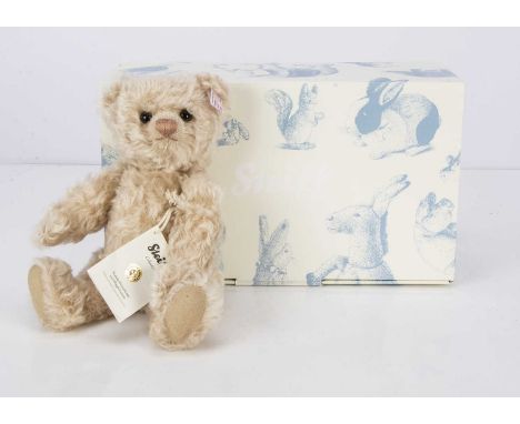 A Steiff limited edition Pearl teddy bear,  998 of 1500, with ivory mohair, in original box with certificate (nylon cord of n