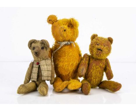 Three pin-jointed stick teddy bears, comprising of a British 1915-20 bear with blonde mohair, clear and black glass eyes with