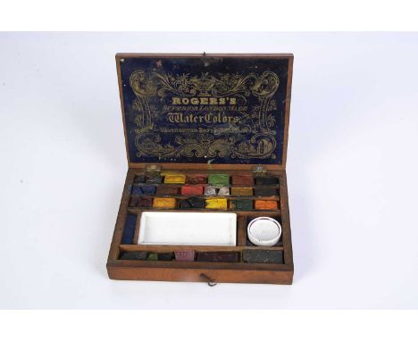 A Roger’s Watercolor wooden paint box circa 1900, single tray, eighteen paint cakes, large porcelain rectangular paint try an