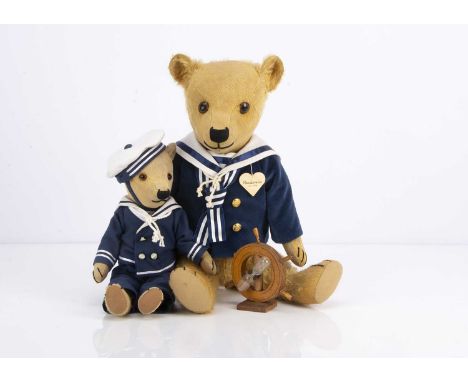 Two 1930s Chiltern type teddy bears,  dressed as sailors, Henderson, the larger teddy bear with golden mohair, brown and blac