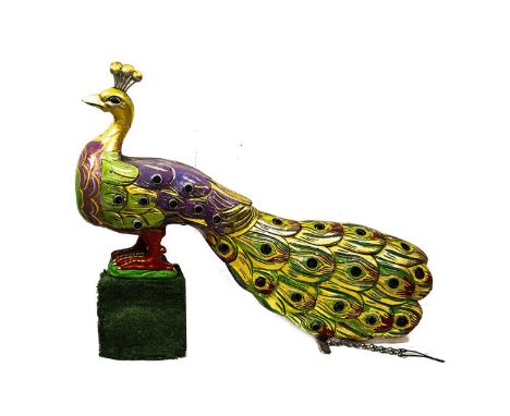A Lakin (England) carved and painted wooden Fairground Peacock circa 1935, from a spinner side show, old showman’s paint and 