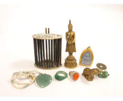 Oriental jewellery to include a carved nephrite ring, Thai standing Buddha figure, silver Tibetan cabochon pendant, and other