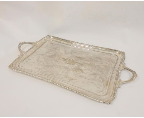 Silver tray, rectangular with slightly incurved sides and gadroon and scroll edges by Hamilton & Inches Edinburgh 1912, 62 cm