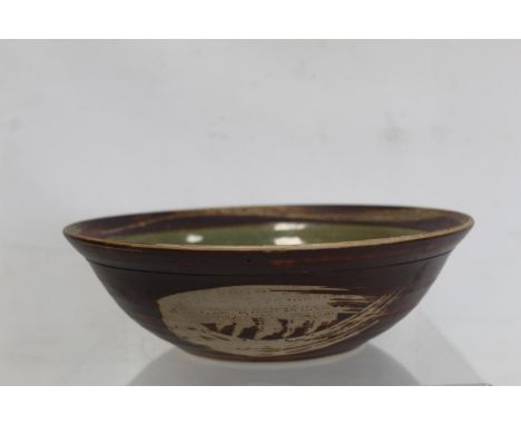 Harry and May Davis Crowan, Cornish studio pottery circular bowl with wax resist, brown and celadon glazed decoration, impres