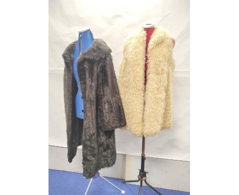 Vintage cream angora mohair goatskin long waistcoat or gillet; also a vintage Alexon black faux fur coat, size 16. (2).