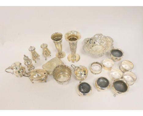 Two silver embossed vases, a cigarette case, various condiments and other items. 768g 