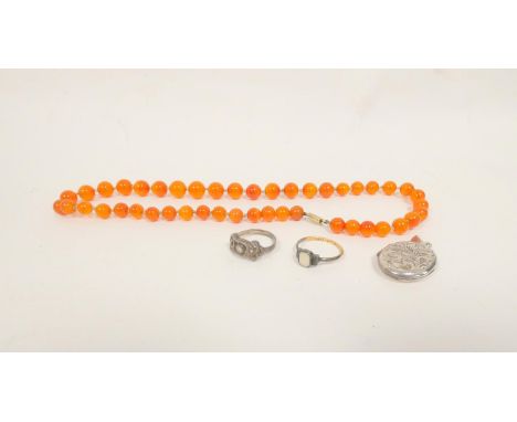 A 9ct Art Deco opal ring set in silver 1.8g, a silver celtic knot ring, silver locket and a amber glass necklace with gold cl