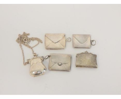 Group of novelty silver stamp holders in the form of letters, an example by Adie &amp; Lovekin Ltd Birmingham 1912. Also a co