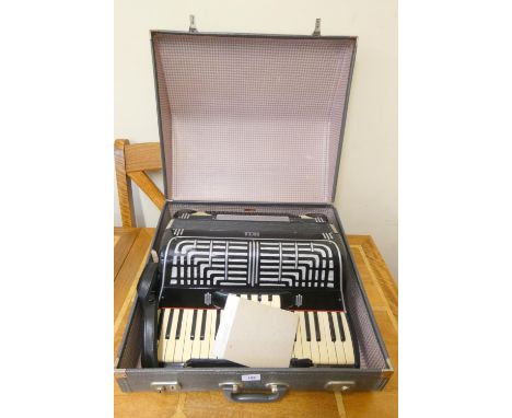 An Italian Orfeo 120 accordion, in black finish and fitted leather case. 