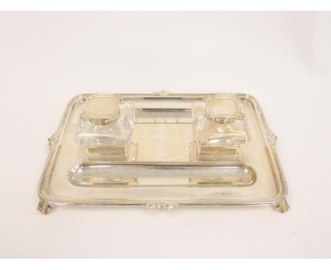 Silver inkstand, rectangular with moulded and scroll edges, two mounted glass receivers (one cap detached) for Brook &amp; So