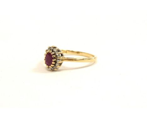 Hallmarked 9ct gold ruby and diamond cluster ring, size O 2.6g .15ct&nbsp; 