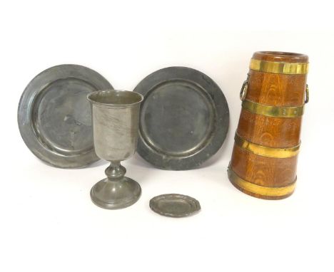 Pair of 19th century pewter communion plates or chargers, diameter 30cm, along with a pewter communion cup and small dish bea