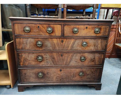 Georgian mahogany chest of drawers with two short drawers above three long graduated drawers on bracket feet. Height 92cm. 