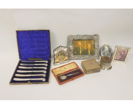 Silver cigarette box, four mounted frames and other items. 