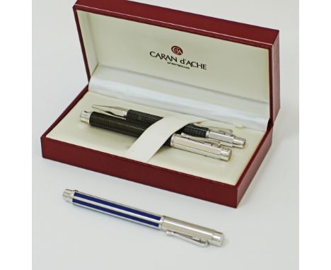 A collection of three Rhodium coated Caran d'Ache luxury writing instruments comprising of a ballpoint pen L135mm and a rolle