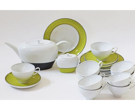 A Portugese SPAL porcelain tea service comprising of 10 cups, 3 saucers, five cake plates, a teapot and a sugar bowl. The tea