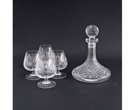 Four Somerset crystal brandy balloons H125mm together with a Waterford ship’s decanter in the Donegal pattern with stopper H2