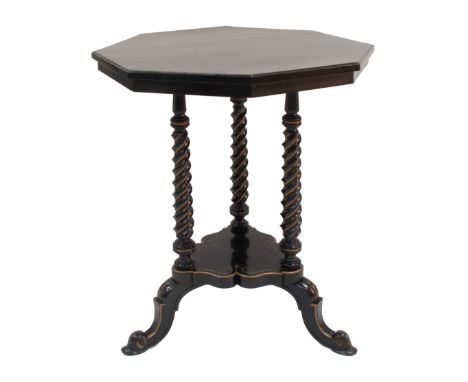 An English Aesthetic movement ebonised and parcel gilt tripod occasional table by James Shoolbred &amp; Co., the octagonal to