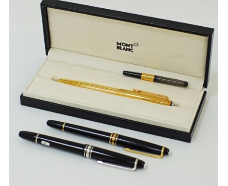 Three Mont Blanc luxury writing instruments comprising of a roller ball pen "MEISTERSTUCK" in black body and yellow metal lin
