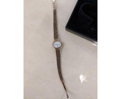 A ladies Rotary 9ct gold manual wind wristwatch on a 9ct gold bracelet, 17gLocation: 