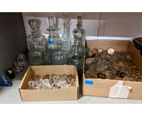 A small group of cut glass decanters and stoppers, and others to include a Venetian decanter with applied strawberry print an