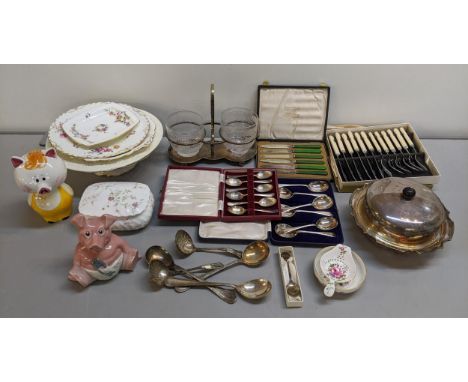 Ceramics and silver plate to include a muffin dish, spoons, fish knives and forks, a Wade Natwest money bank, a Royal Crown D