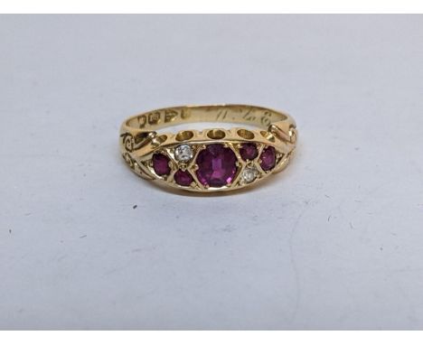 An 18ct gold, ruby and diamond ring, 3g 